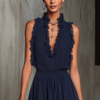 Jumpsuit blu navy in chiffon plissettato con dettagli in pizzo e finiture con volant